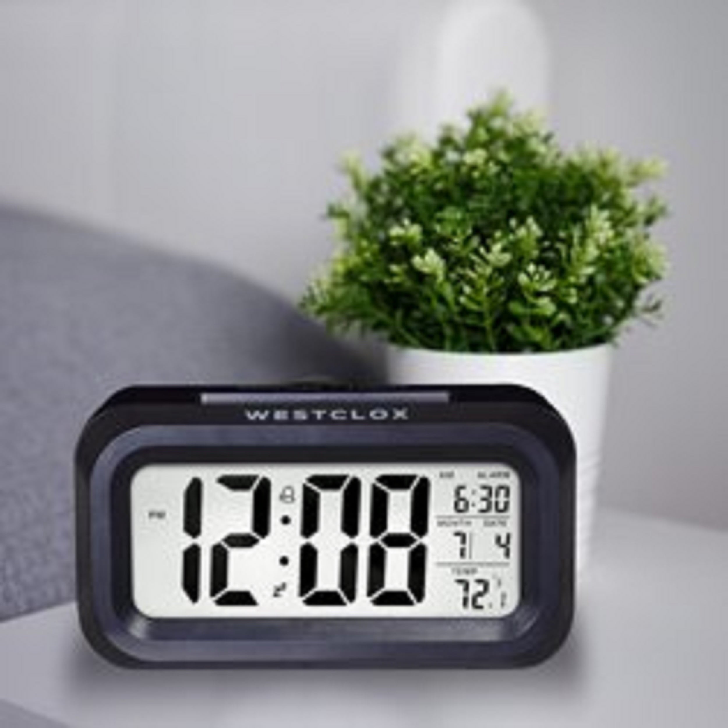 Westclox Black Digital Alarm Clock with Day/Date Display and LED Backlight- Battery Operated